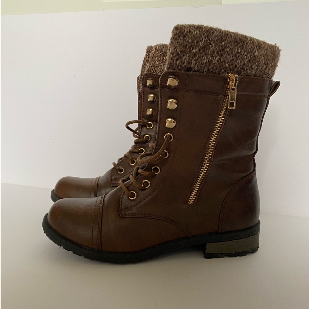 Near new lace up boots.